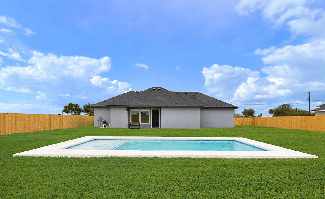 backyard with pool in a sunny day